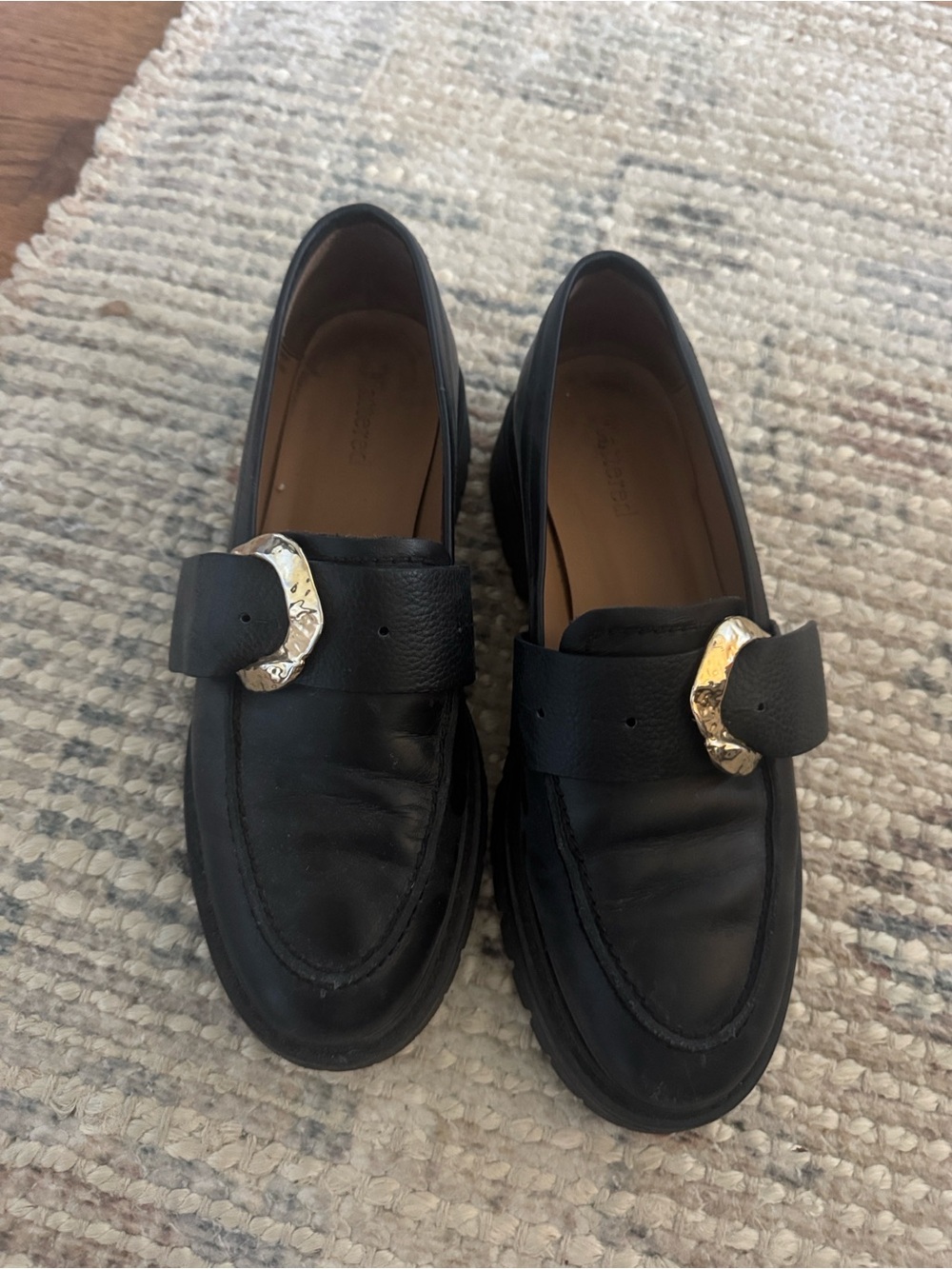 Flattered Black Leather Loafers with Gold Buckle